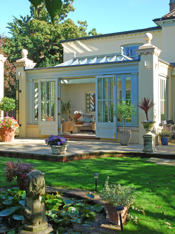 A stunning orangery featuring a rectangular roof lantern as part of the orangery roof