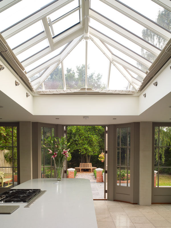 An orangery roof in the form of a rectangular roof lantern above a kitchen island
