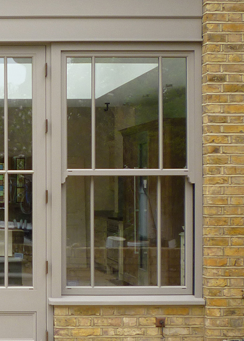 Traditional cord and weights sash window as part of an orangery